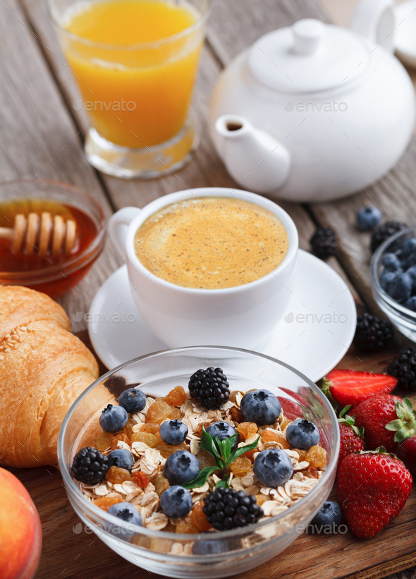 Fresh crusty croissants and muesli for morning meals - Stock Photo - Images