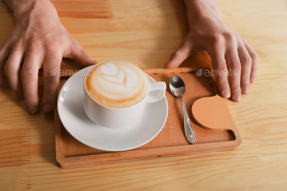 Coffee house counter background with coffe cup, top view - Stock Photo - Images