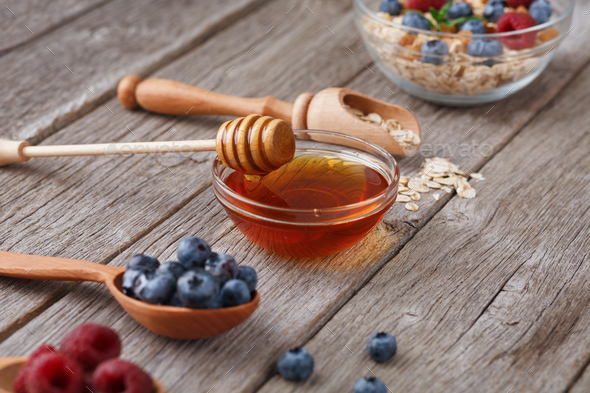 Healthy morning meals background. Tasty ingredients in wooden spoons - Stock Photo - Images