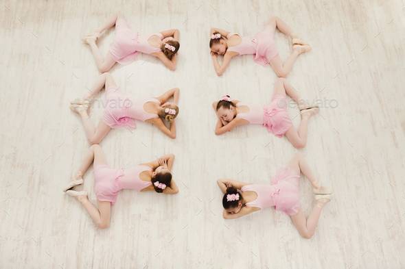 Little girls dancing ballet in studio - Stock Photo - Images