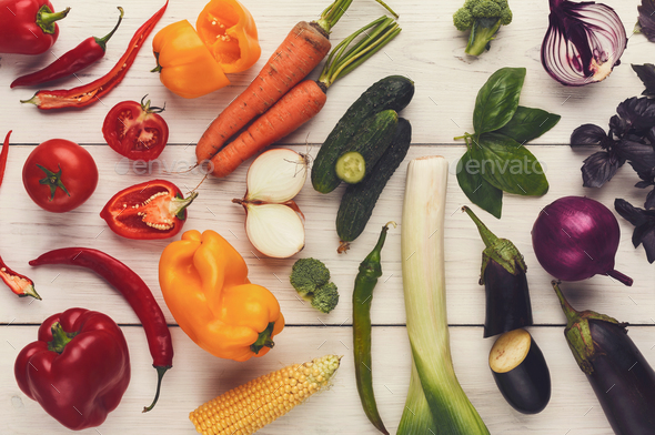 Rainbow background with lots of colorful vegetables - Stock Photo - Images