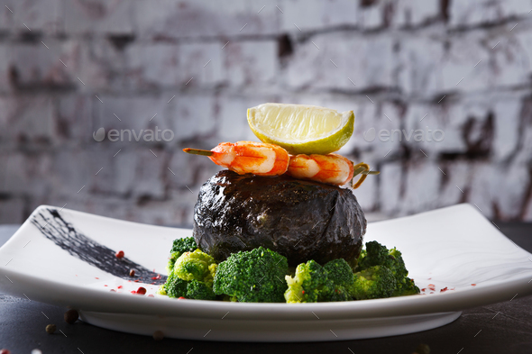 Modern restaurant food. Dorado fillet in nori with shrimps - Stock Photo - Images