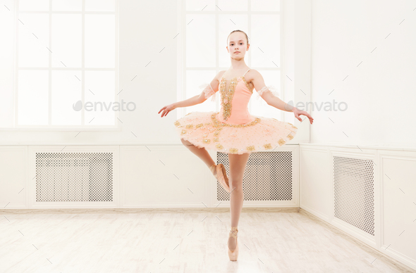 Ballet student exercising in ballet costume - Stock Photo - Images
