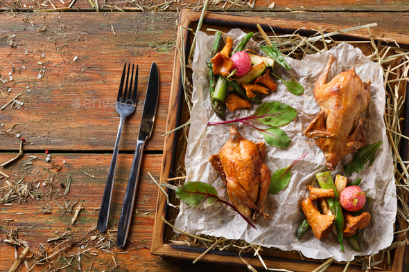 Modern restaurant food. Quails baked with asparagus and chantere - Stock Photo - Images