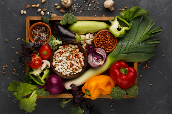Fresh vegetables on wooden tray with copy space - Stock Photo - Images