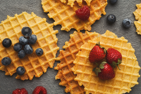 Round belgium waffles with berries - Stock Photo - Images