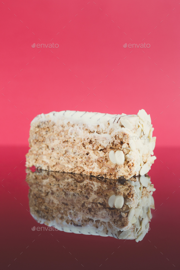 Esterhazy cake slice on mirror table - Stock Photo - Images