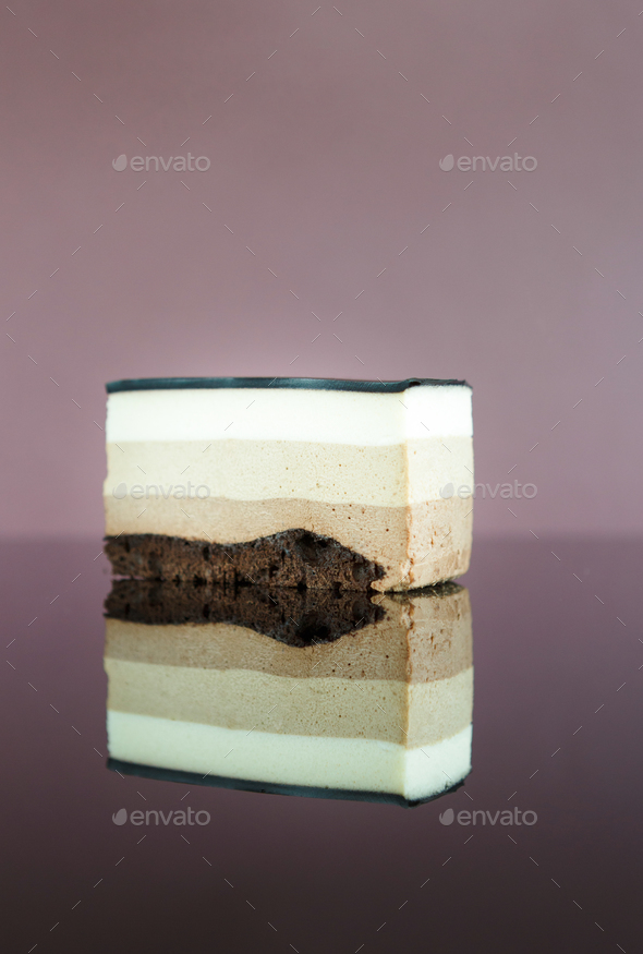 Triple chocolate layer mousse cake with glaze - Stock Photo - Images