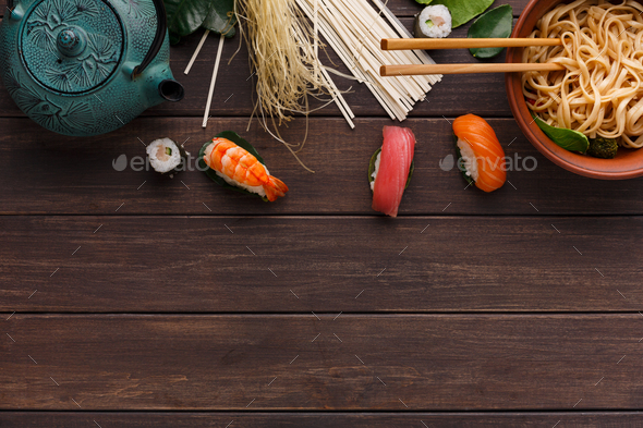Asian food on wooden background, copy space - Stock Photo - Images