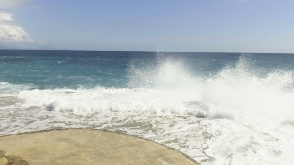 Sea Waves Break on the Stone Pier.