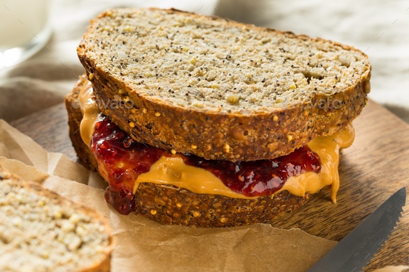 Knife and Sandwich with Bread and Peanut Butter Stock Photo