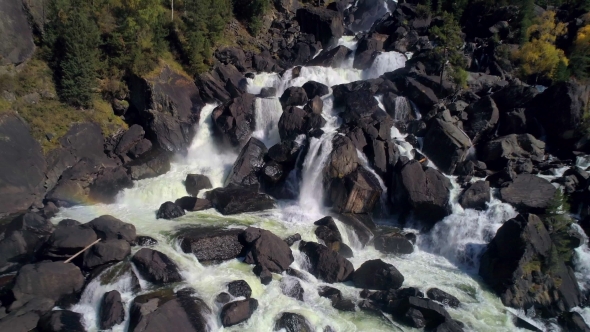 Aerial View of Waterfall, Flying Over Autumn Forest, Waterfall with Big Stones