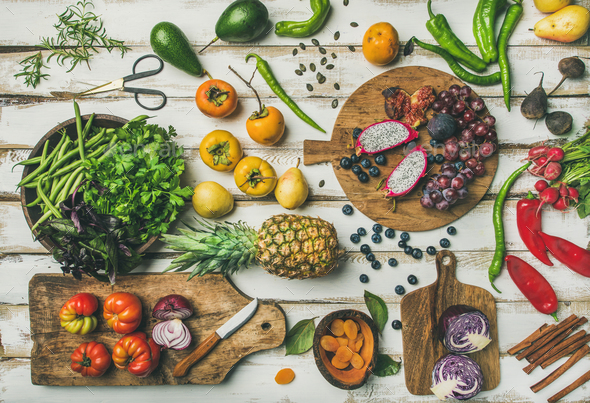 Helathy vegan food cooking background with fruits and vegetables - Stock Photo - Images
