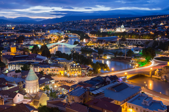 Scenic Top View Of Tbilisi Georgia In Evening Lights Illuminatio - Stock Photo - Images