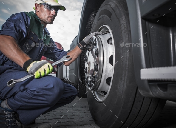 Semi Truck Wheel Maintenance - Stock Photo - Images