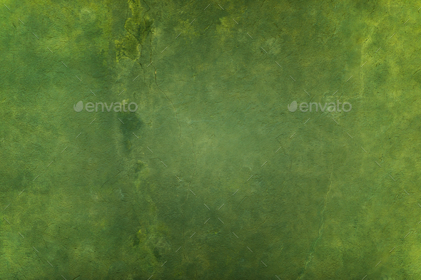 Close-up green painted concrete wall texture background. Stock Photo by aetb