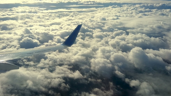 Clouds and Sky As Seen Through the Window of an Aircraft