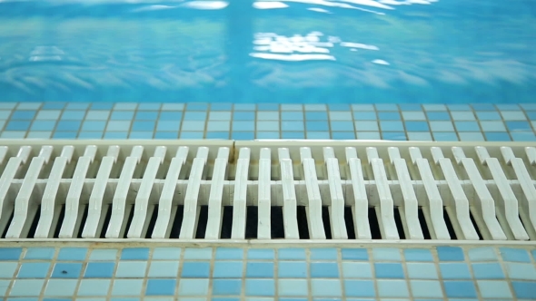 Empty Swimming Pool Tiled Floor and Drainage