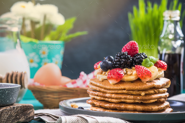 Celebrating Pancake Day or Shrove Tuesday with perfect pancakes Stock Photo by merc67