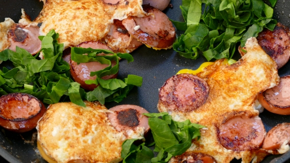 Fried Sausage with Eggs Pour Out Greens