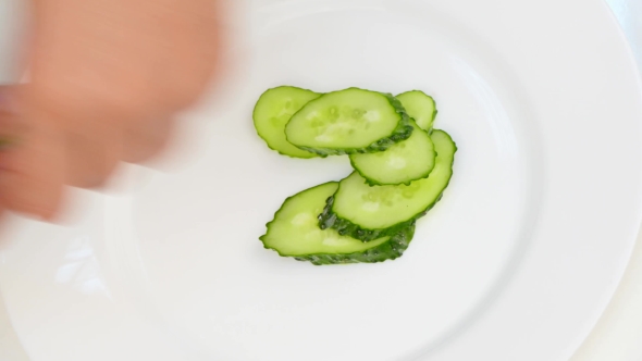 Gently Collect the Sliced Vegetables on a Plate