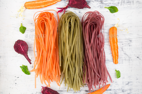 Colored Raw Vegetable Vegetarian Pasta. Stock Photo by bondarillia