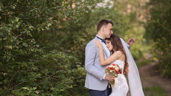 The Bride And Groom In Forest Puts Her Head On Play Preview Video