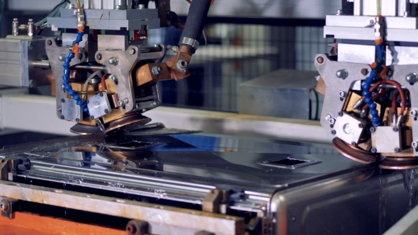 A  View on a CNC Welding Station for Stainless Steel Seams. alt