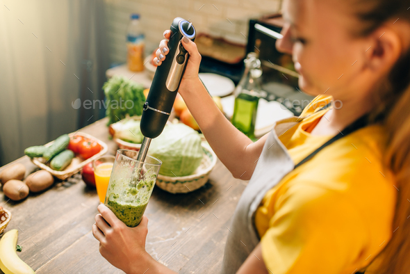Female person cooking, mixing healthy organic food - Stock Photo - Images