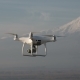 The Quadcopter Is Flying High Above Snowy Mountain - VideoHive Item for Sale
