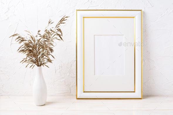 Gold decorated frame mockup with dried grass - Stock Photo - Images