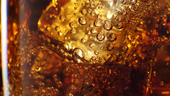 Large Glass of Cold Coke with Ice Cubes