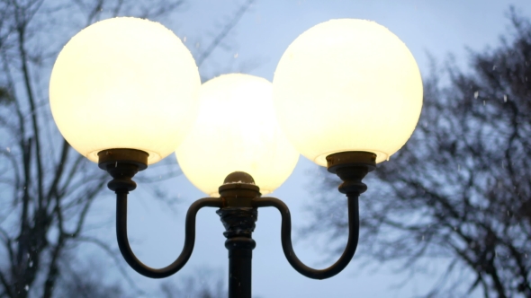 Lanterns Evening Snowfall alt