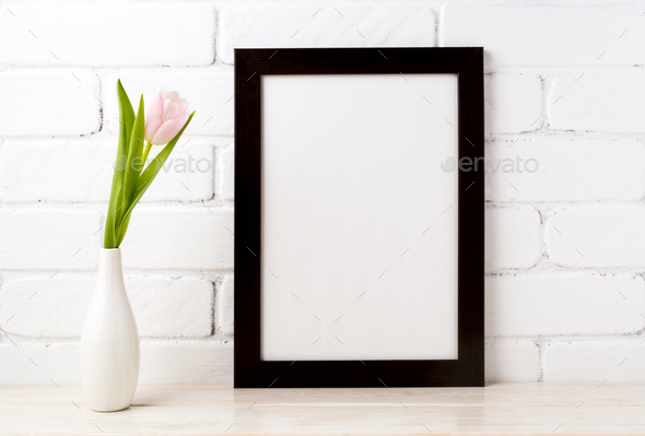 Black brown frame mockup with soft pink tulip in vase - Stock Photo - Images