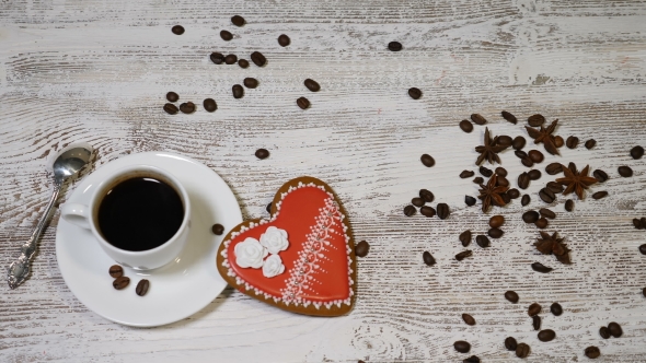 Love Relations St Valentine Concept of Cup of Coffee and a Ginger Biscuit Heart Shaped alt