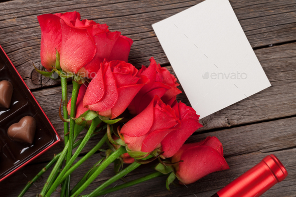Valentines day with red roses and chocolate - Stock Photo - Images
