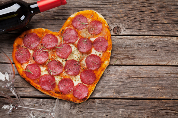 Heart shaped pizza - Stock Photo - Images