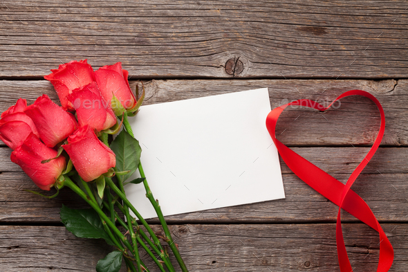 Valentines day greeting card with red roses - Stock Photo - Images