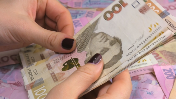 Businessman's Hands Counting Money Hryvnia. Counting Ukrainian Money.