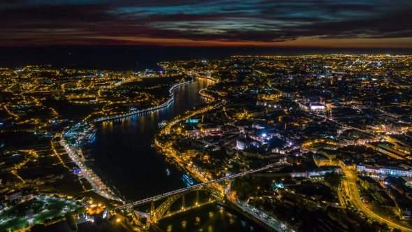 Portugal Porto Aerial  Old City Centre Bridges Roofs at Night Clouds alt