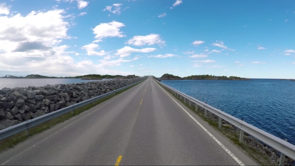 Driving a Car on a Road in Norway Atlantic Ocean Road or the Atlantic Road alt