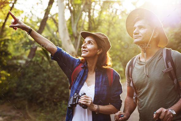 Couple trekking together - Stock Photo - Images