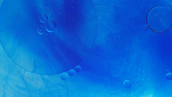 Chaotic Movement Expansion of the Bubble Flow Swirls of Blue and White Colors alt