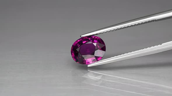 Natural Oval Cut Rhodolite Garnet on the Turning Table
