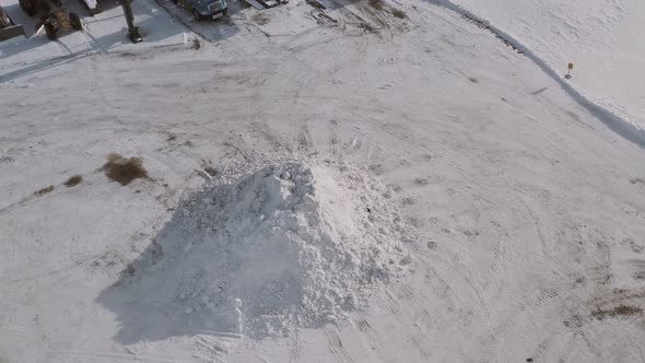 panning shot of snow pile alt