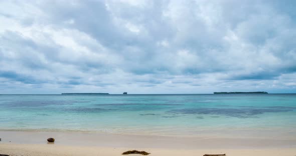 Time lapse: wind storm over tropical beach and sea dramatic sky moving clouds alt