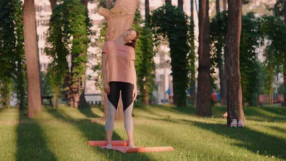 Athlete Doing Flexibility Exercises Outdoors