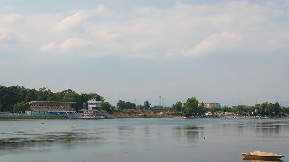 Time-lapse of Idroscalo lake park, canoes at the Idroscalo Park in Milan at overcast summer day alt