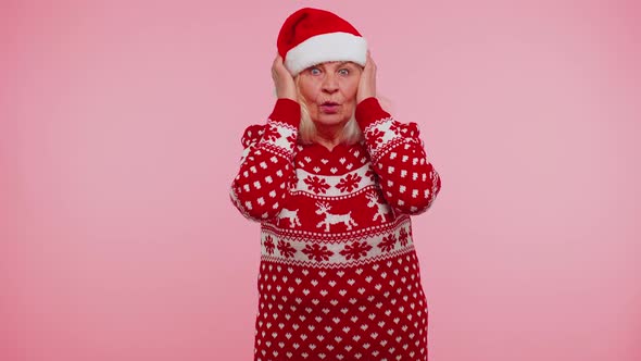 Senior Grandmother Woman in Christmas Clothing Covering Ears Gesturing No Avoiding Advice Ignoring alt
