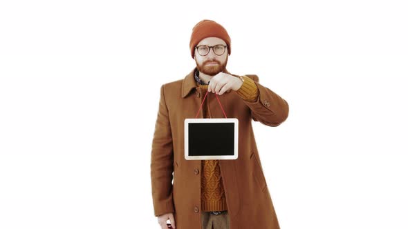 Vertical Studio Shot of a Handsome Hipster Guy in Semielegant Autumn Outwear Holding Wooden Copy alt